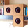 custom office storage system of bamboo plywood with red lenses